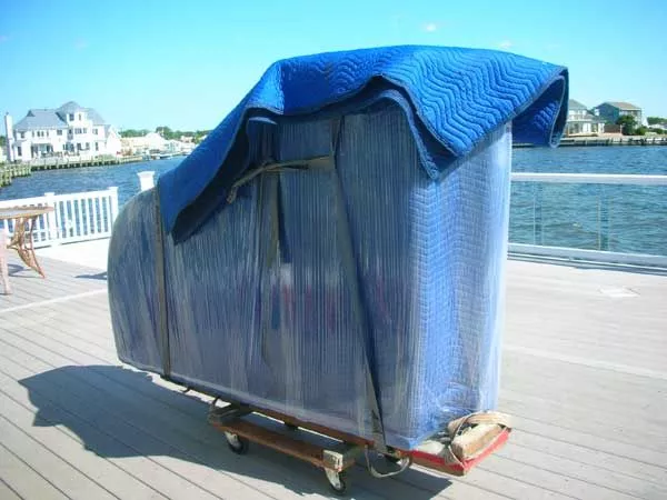 vi flyttat ditt piano och transporterar det dit du vill